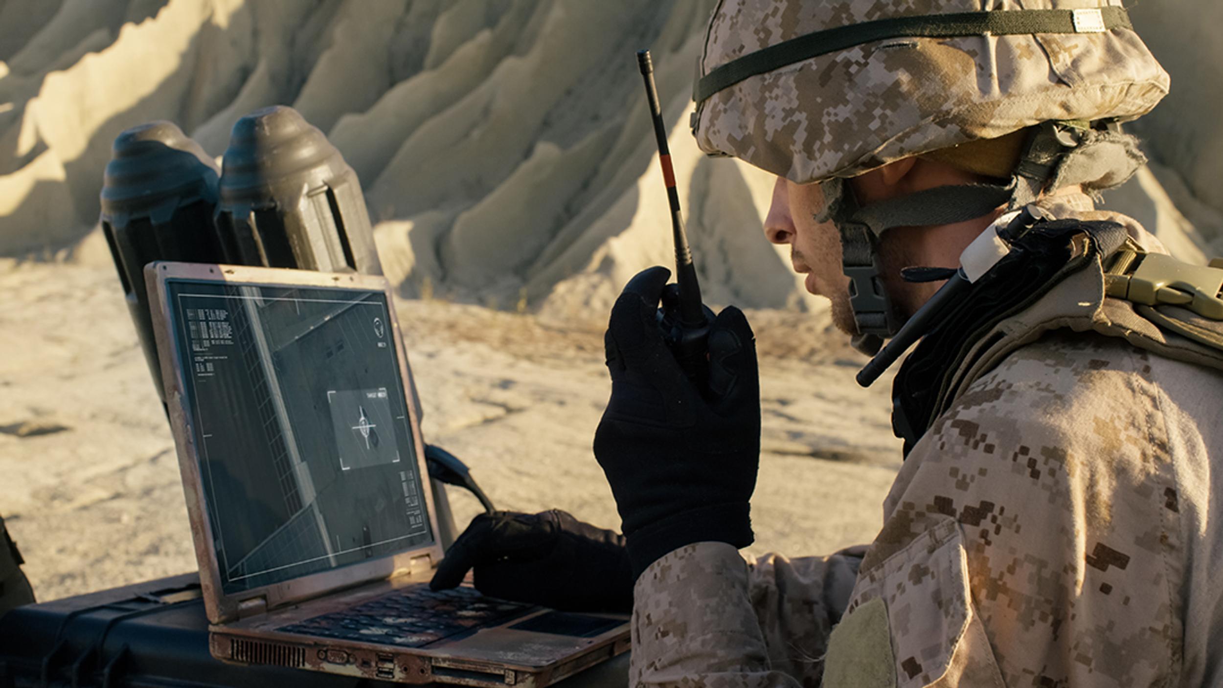 Solider using laptop